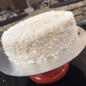Moist single-layer pineapple coconut cake with a tropical Southern twist – made fresh with real ingredients and big flavor.